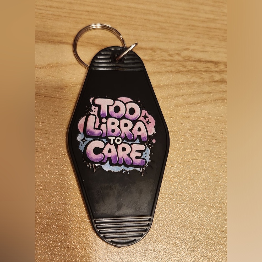 Black Keychain with 'Too Libra to Care' Design